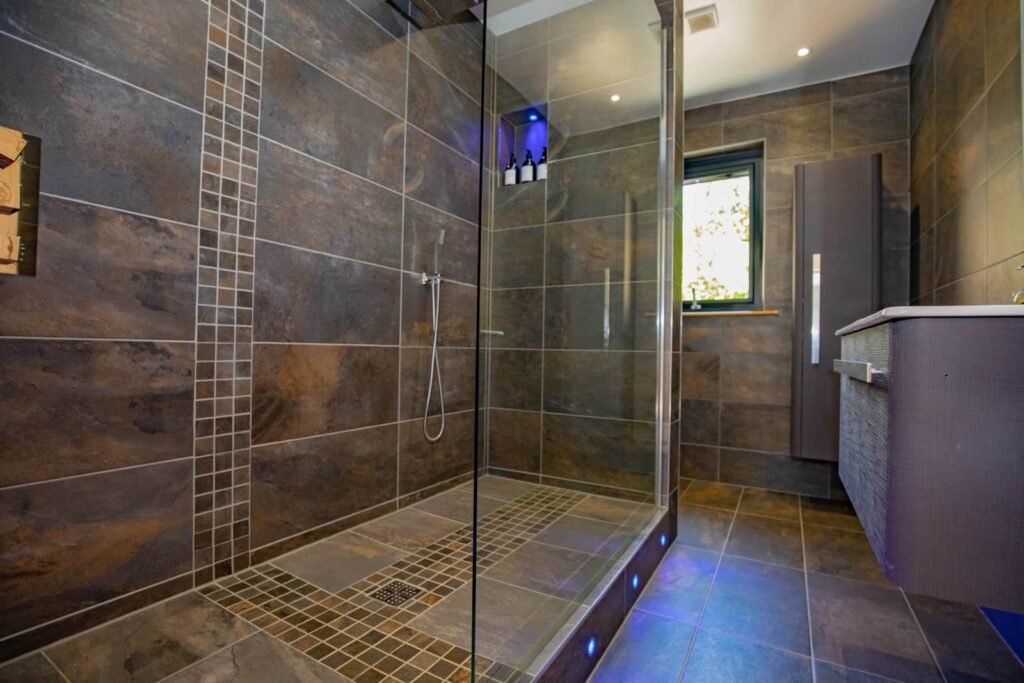 African slate style walk in wet room with cascade Shower 1